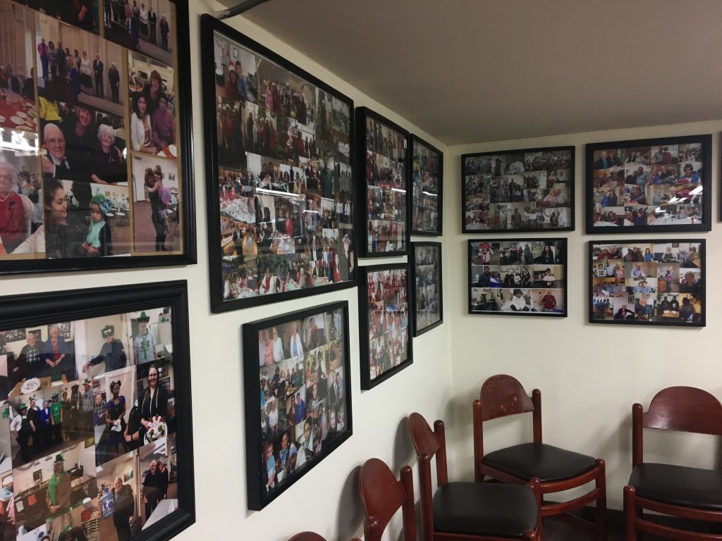 A wall of photographs at Haven on the Queensway