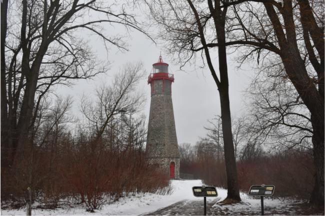 Red lighthouse during the winter time.