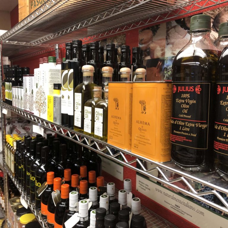 IMG_6872 Oils and vinaigrettes on a metal shelf.