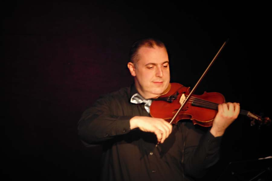 Violinist performing on stage