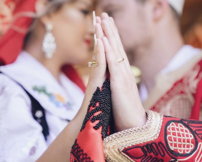 Couple holding hands