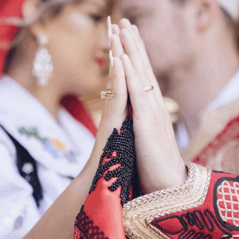 Couple holding hands
