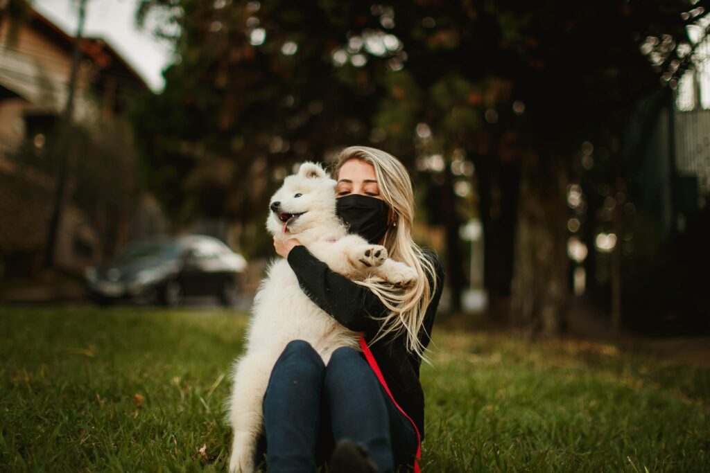 Woman holding dog