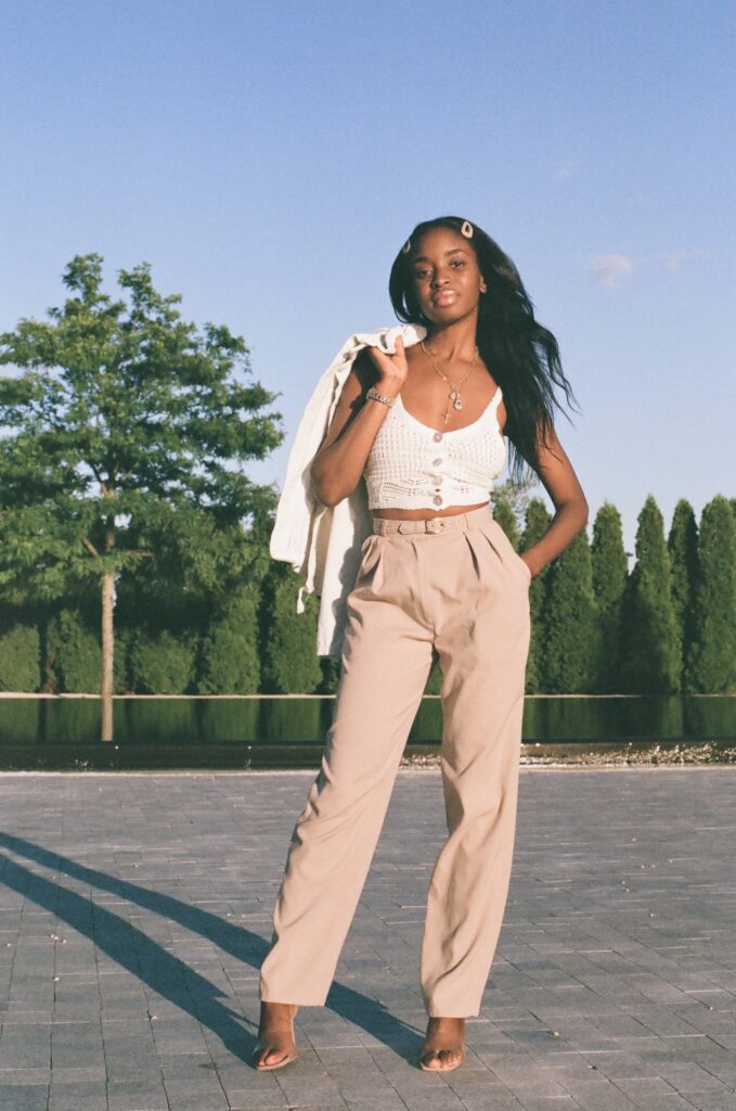 Image of Colette Liburd wearing pink and white