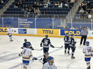 TMU Bold men's hockey team playing against University of Toronto