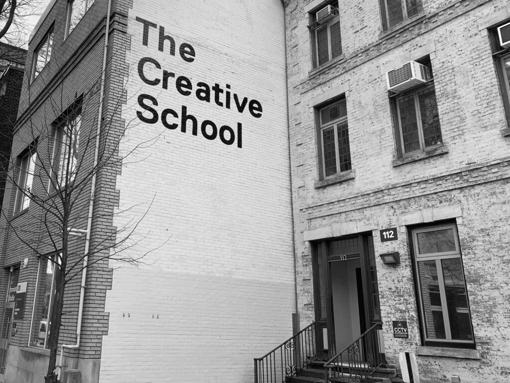 "The Creative School" written on the side of the building