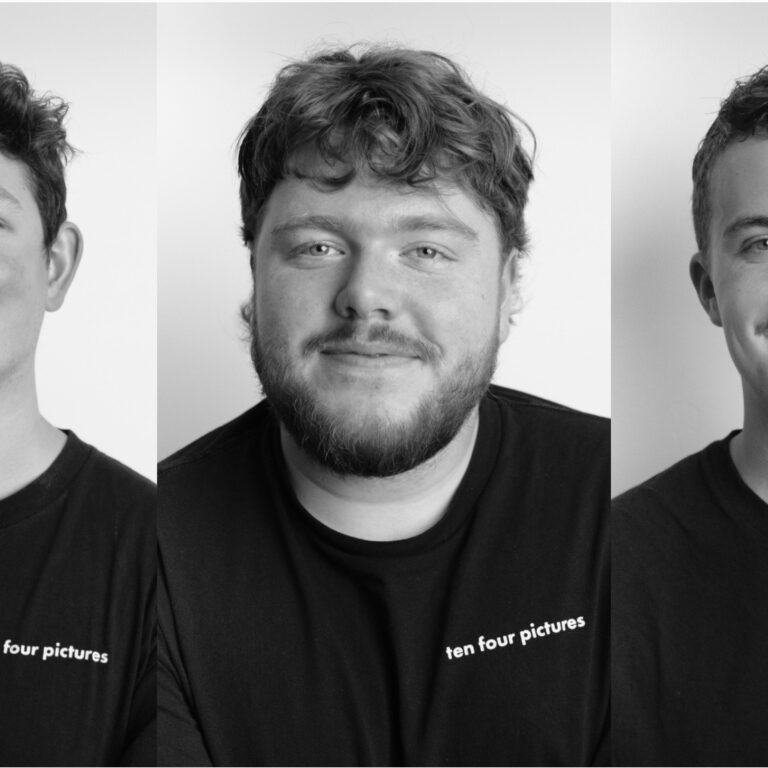 Three boys smiling, wearing T-shirts that say "Ten Four Pictures"