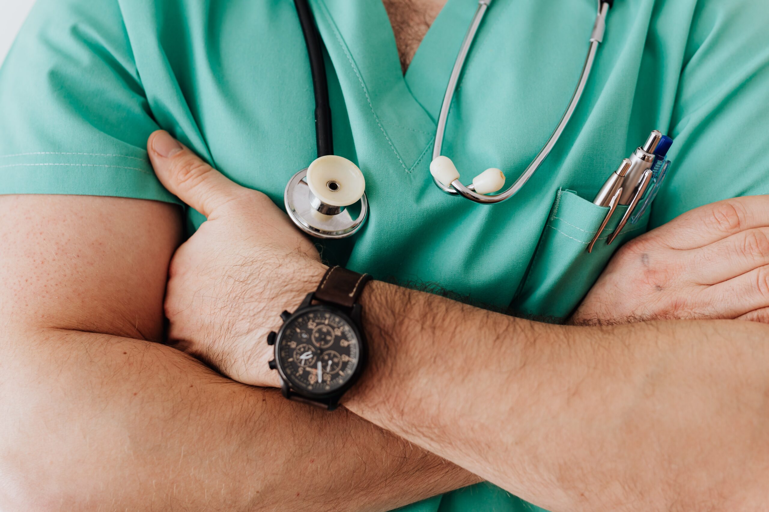 Unregcognizable doctor with a stethoscope around the neck by Karolina Grabowska