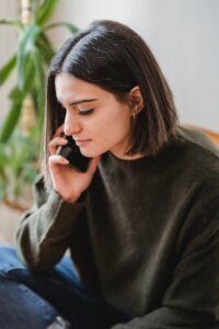 Woman on the phone in her home