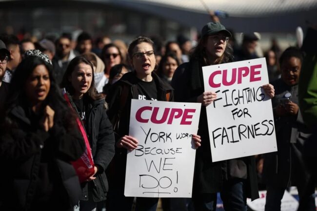 CUPE members holding signs with emotional facial expressions.