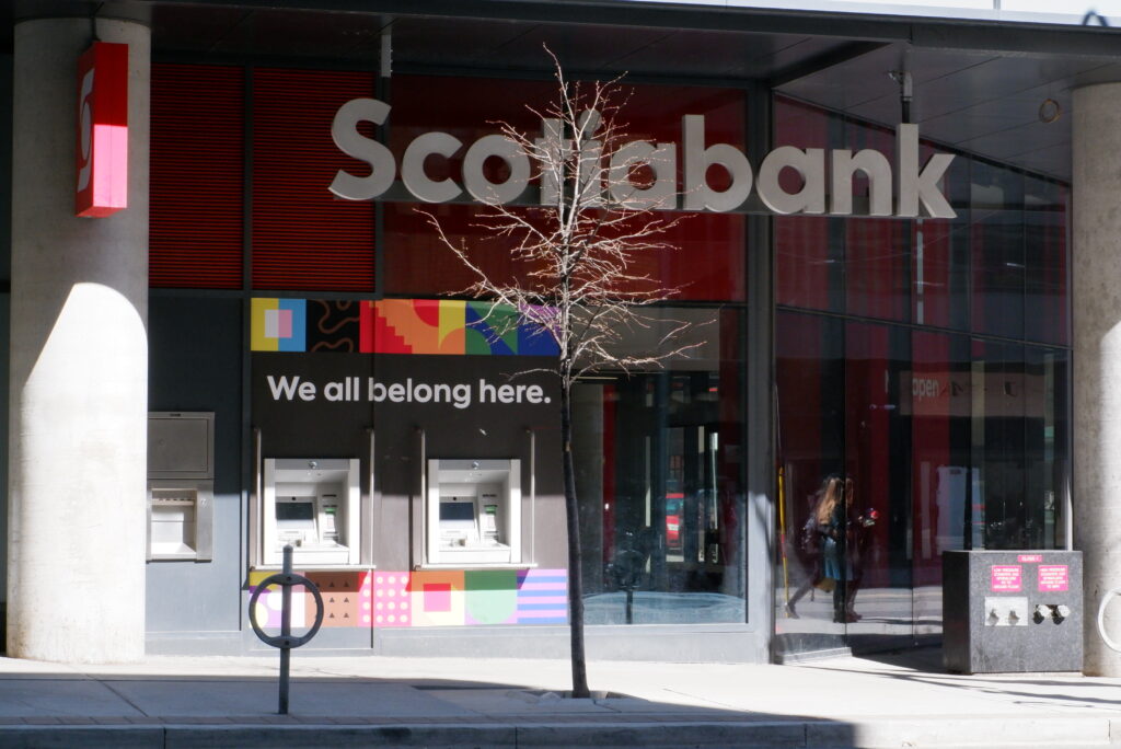 The front of a Scotiabank building featuring an LGBTQ inclusion statement on an ATM