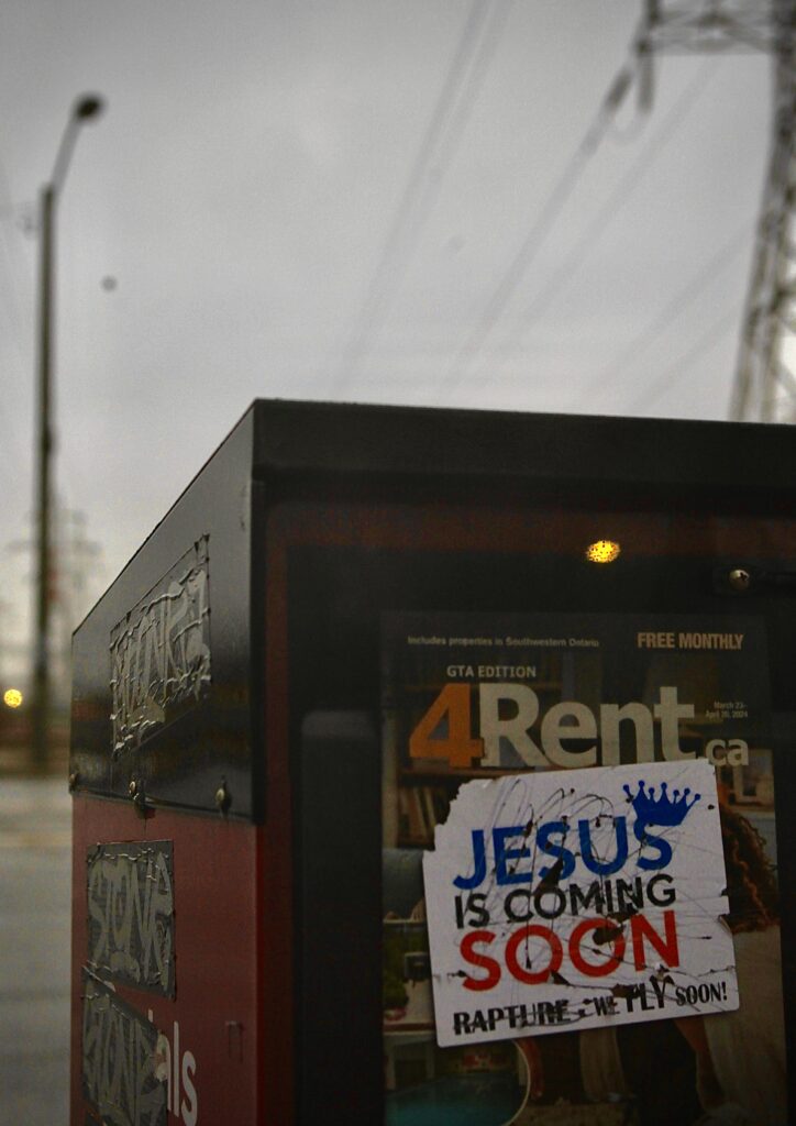 Mail box with 4Rent magazine covered with sticker that reads, "Jesus is coming soon. Rapture "we fly soon"